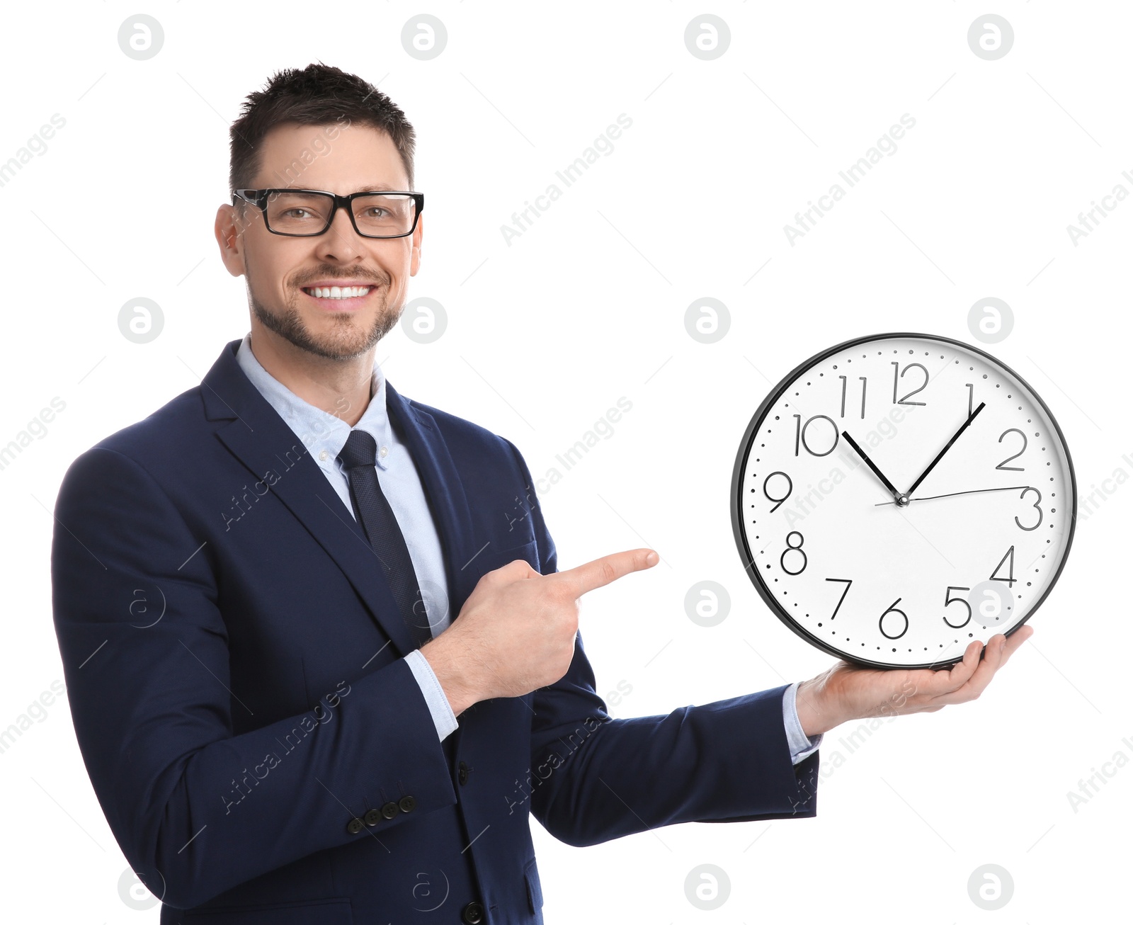 Photo of Happy businessman pointing on clock against white background. Time management