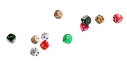 Image of Many different dice in air on white background