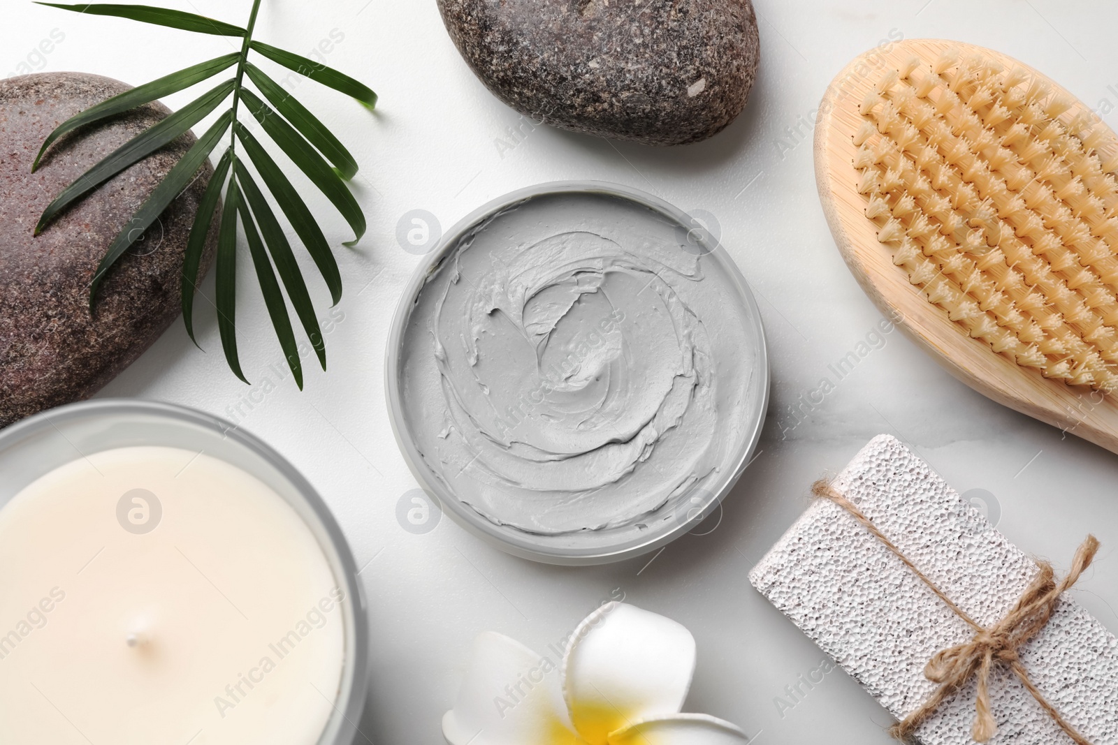 Photo of Flat lay composition with different spa products on white marble table