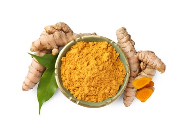 Photo of Bowl of aromatic turmeric powder, leaves and raw roots isolated on white, top view