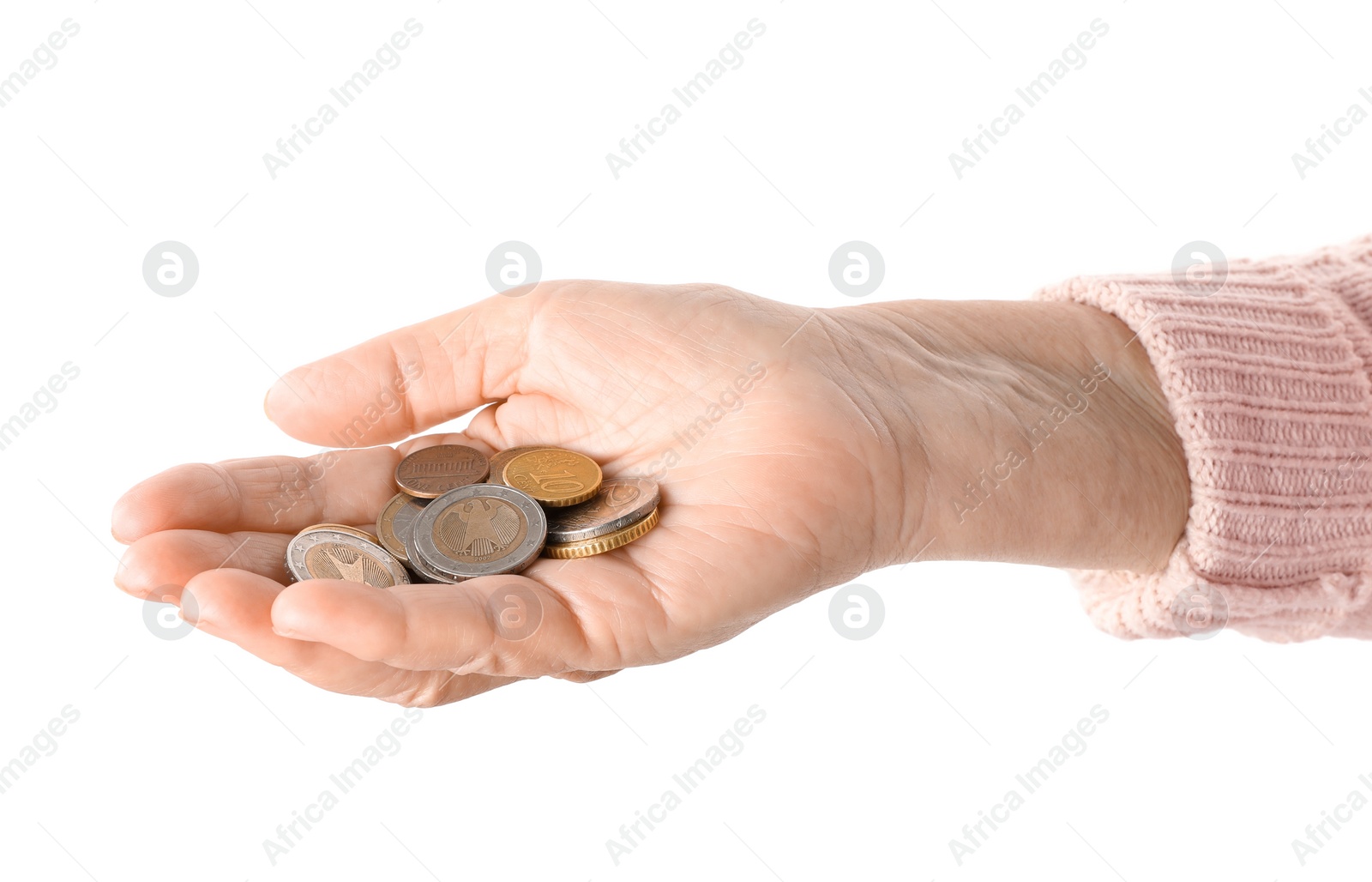 Photo of Elderly woman holding coins on white background, closeup