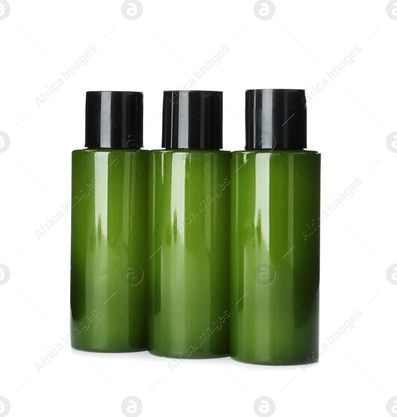 Photo of Bottles with cosmetic products isolated on white