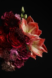 Beautiful bouquet of fresh flowers on dark background