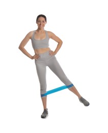 Photo of Woman doing sportive exercise with fitness elastic band on white background