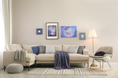 Photo of Stylish sofa in modern living room interior