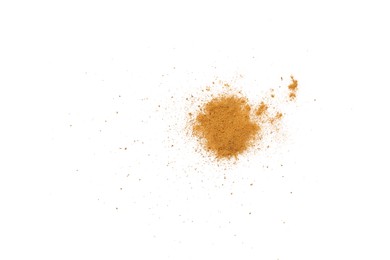 Brown dust scattered on white background, top view