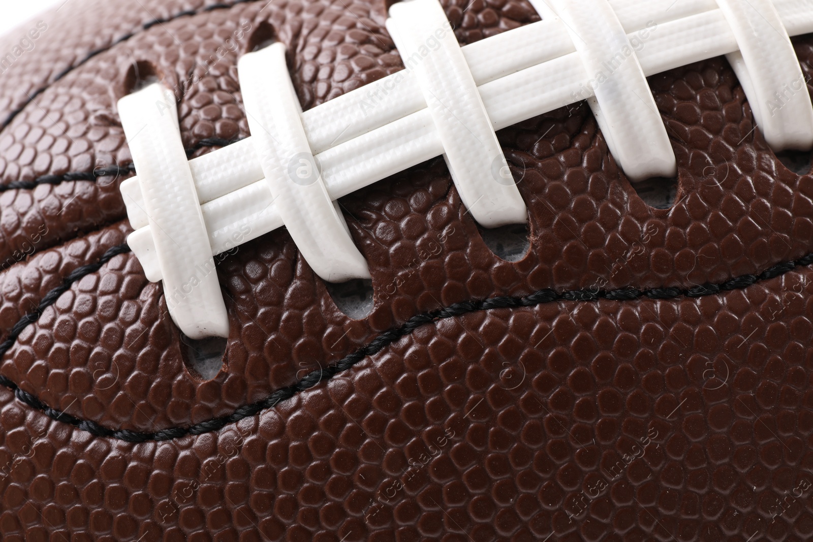 Photo of Leather rugby ball as background, closeup view