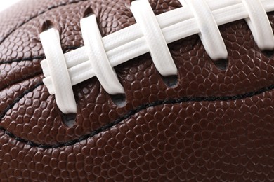 Photo of Leather rugby ball as background, closeup view