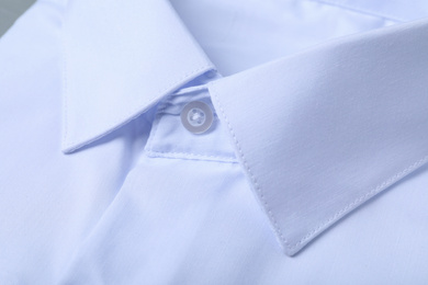 Closeup view of stylish white shirt. Dry-cleaning service