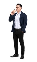 Businessman in suit with cup of drink on white background