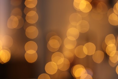 Photo of Blurred view of beautiful Christmas lights. Bokeh effect