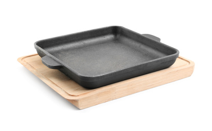 Baking dish and wooden board isolated on white. Cooking utensils