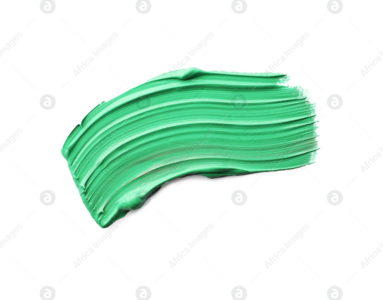 Photo of Green oil paint stroke on white background, top view