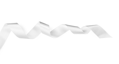 Photo of Satin ribbon on white background, top view