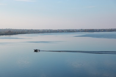 Photo of Beautiful view of motorboat on river in morning