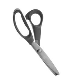 Photo of New pair of sewing scissors on white background