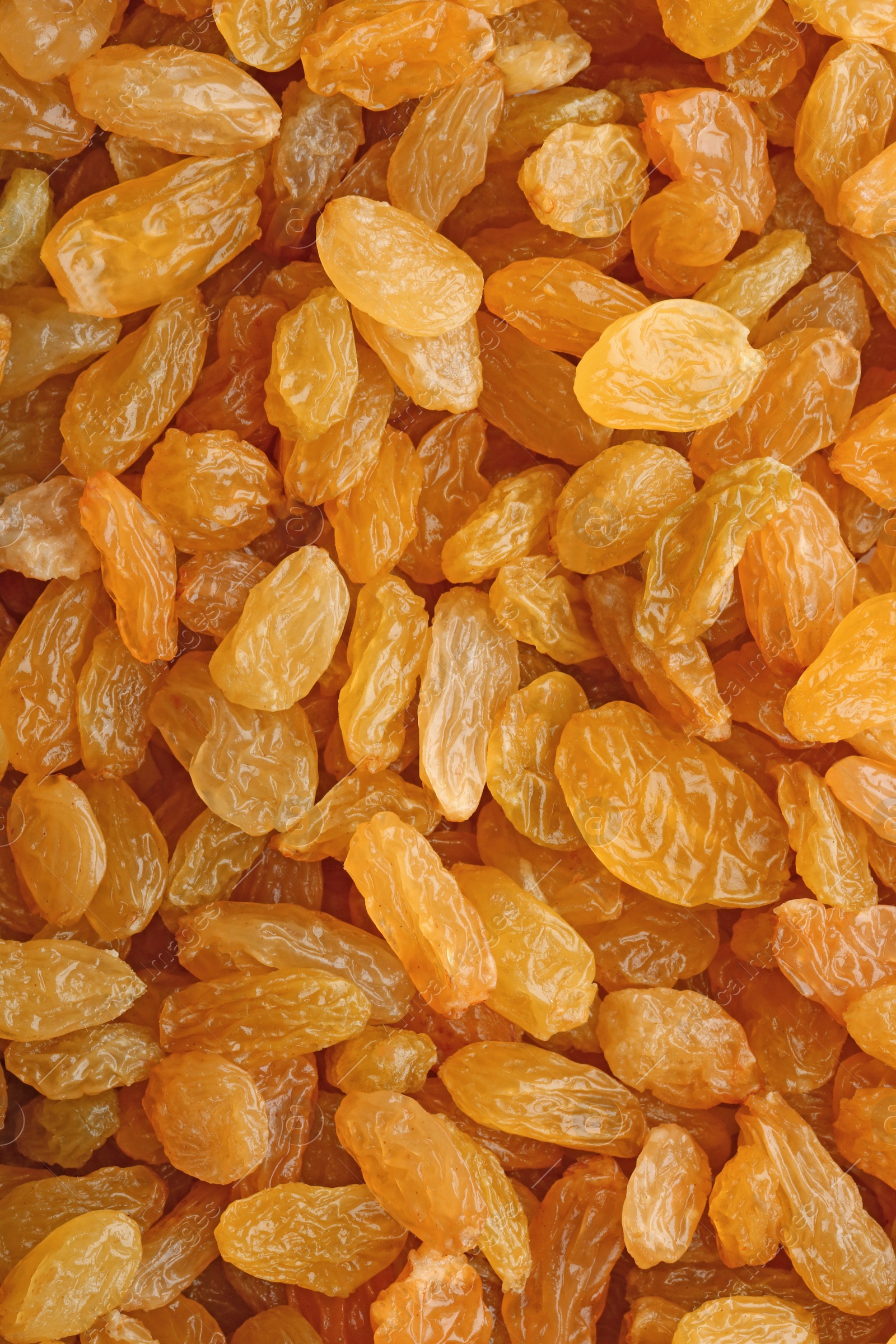 Photo of Tasty raisins as background, top view. Healthy dried fruit