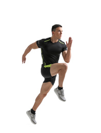 Photo of Athletic young man running on white background