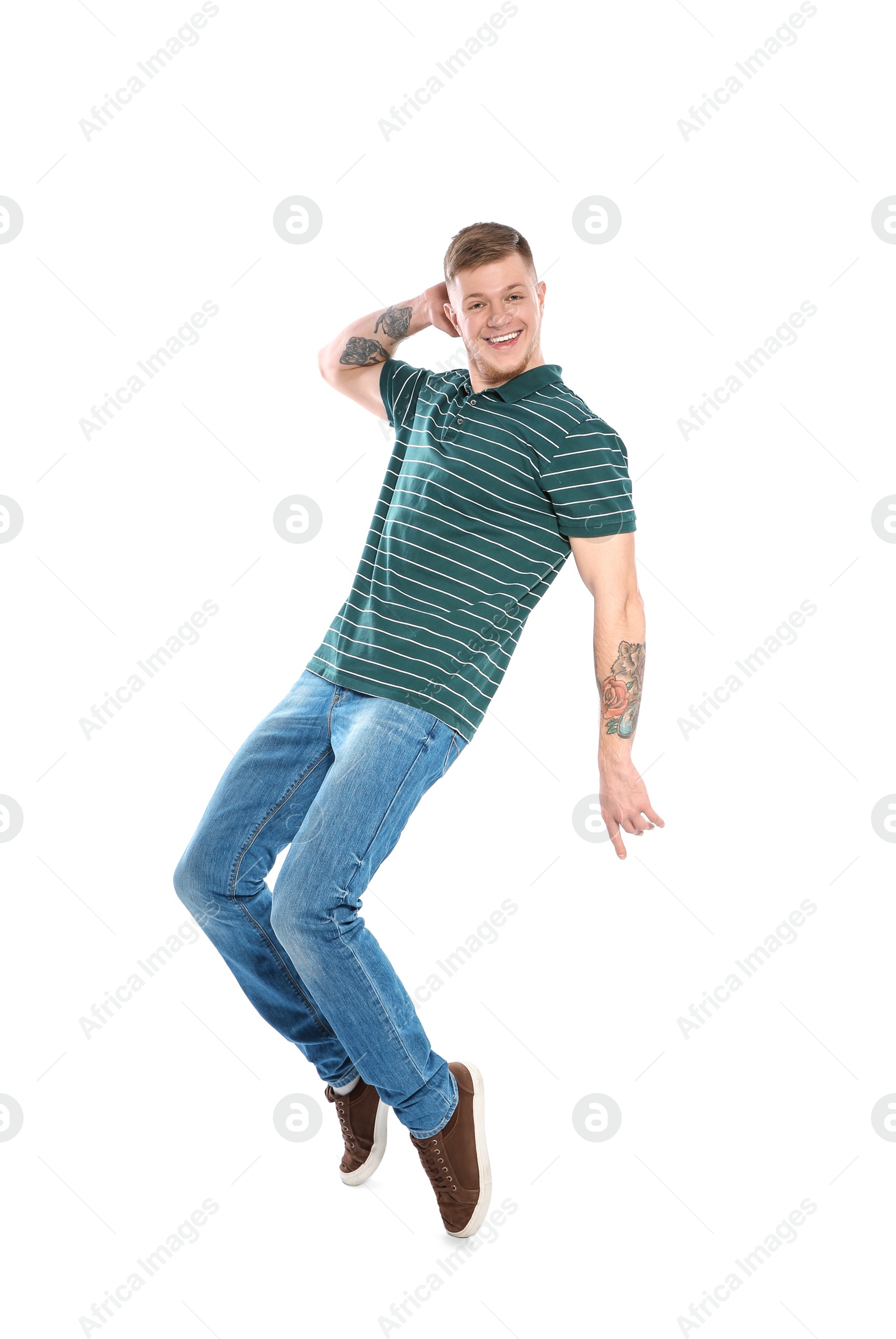 Photo of Handsome young man posing on white background