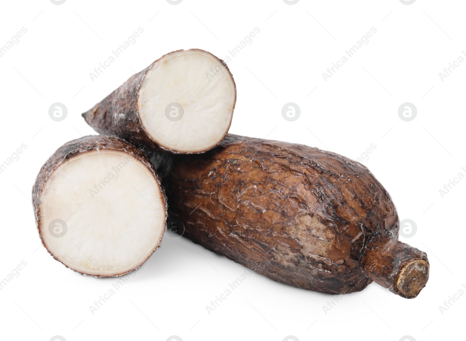 Photo of Whole and cut cassava roots isolated on white