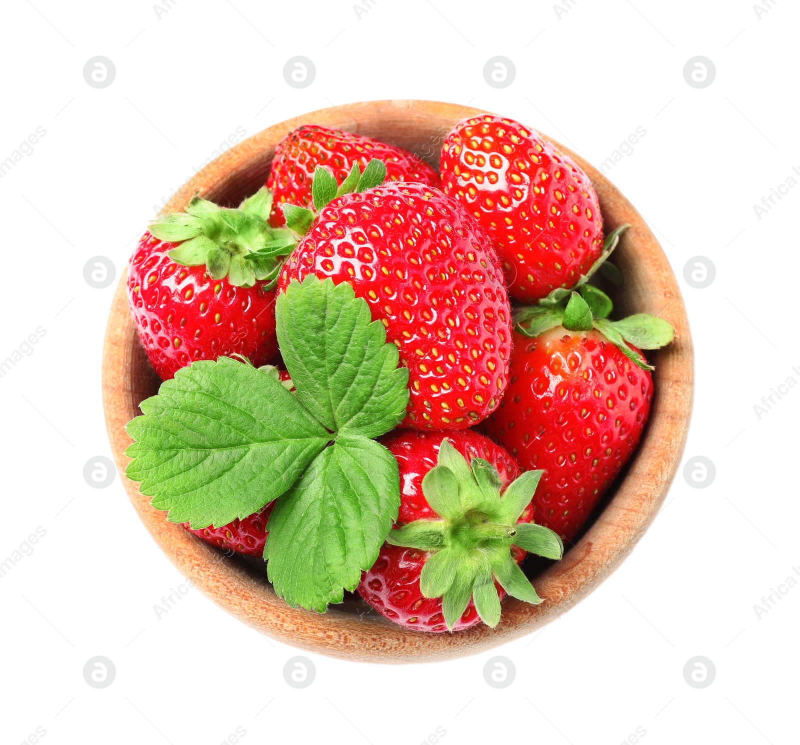 Photo of Fresh strawberries in wooden bowl and green leaf isolated on white, top view