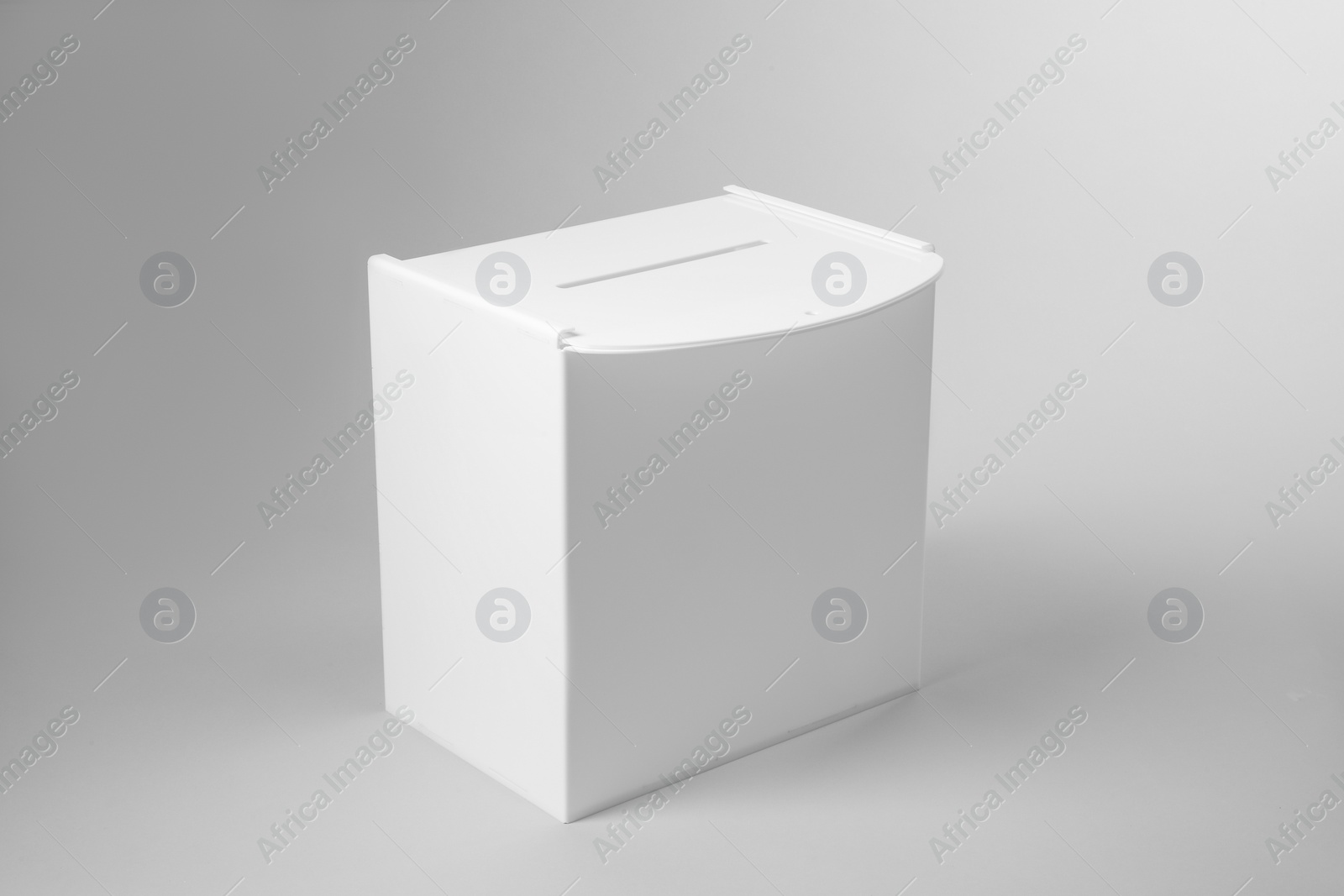 Photo of One ballot box on light grey background. Election time