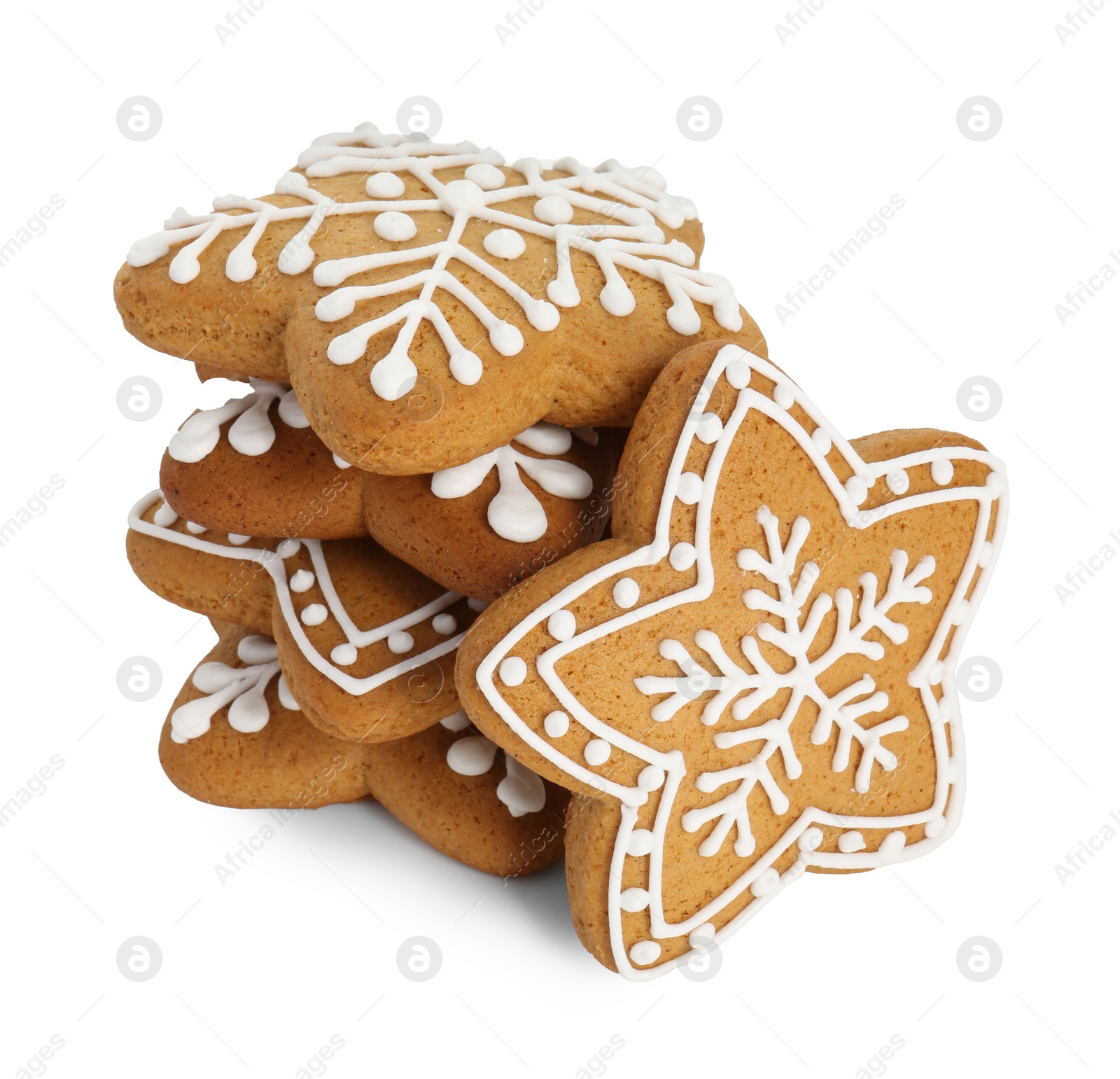 Photo of Tasty star shaped Christmas cookies with icing isolated on white