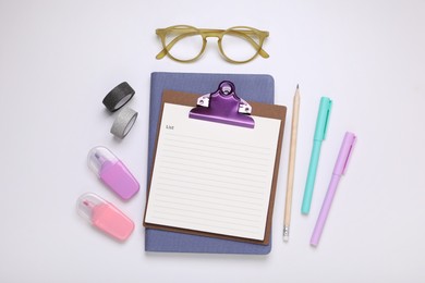 Photo of To do notes, planner, stationery and glasses on white background, flat lay