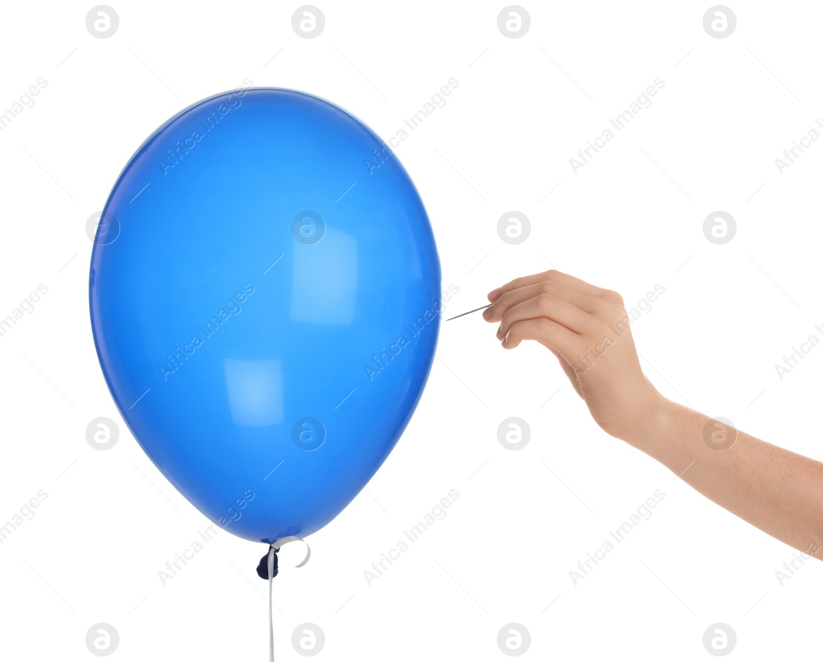 Photo of Woman piercing blue balloon on white background