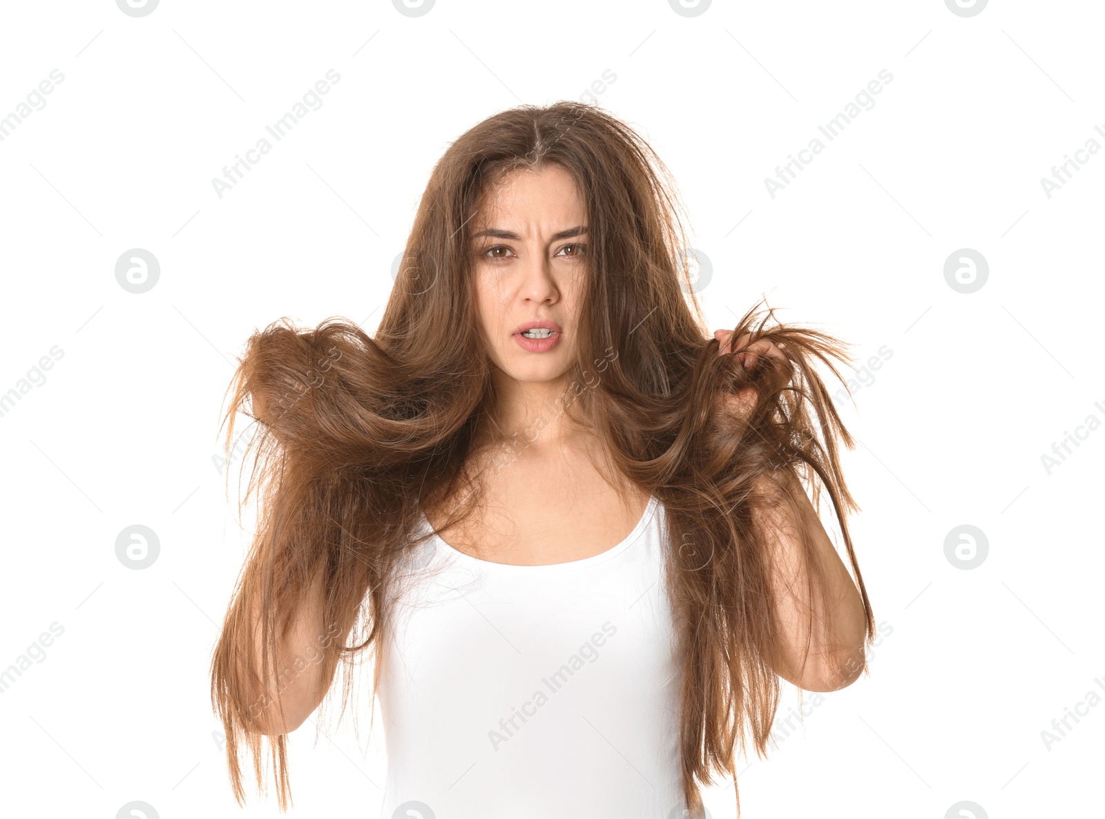 Photo of Emotional woman with tangled hair on white background