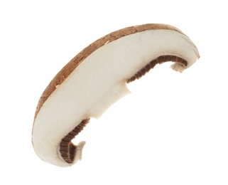 Photo of Slice of raw mushroom on white background