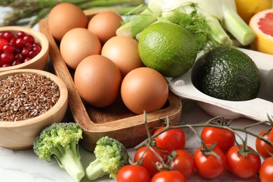 Many different healthy food on light table, closeup