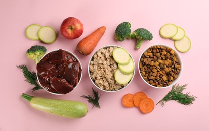 Photo of Pet food and natural ingredients on pink background, flat lay