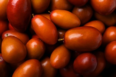 Closeup view of fresh Ziziphus jujuba fruits as background