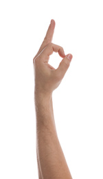 Photo of Man showing okay gesture against white background, closeup of hand