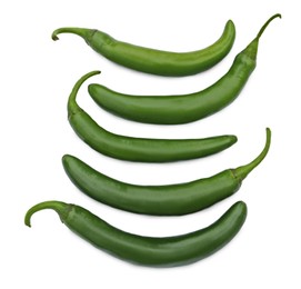 Photo of Green hot chili peppers on white background, top view