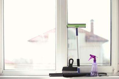 Photo of Equipment for tinting on window sill indoors. Space for text