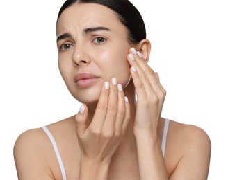 Young woman with dry skin on white background