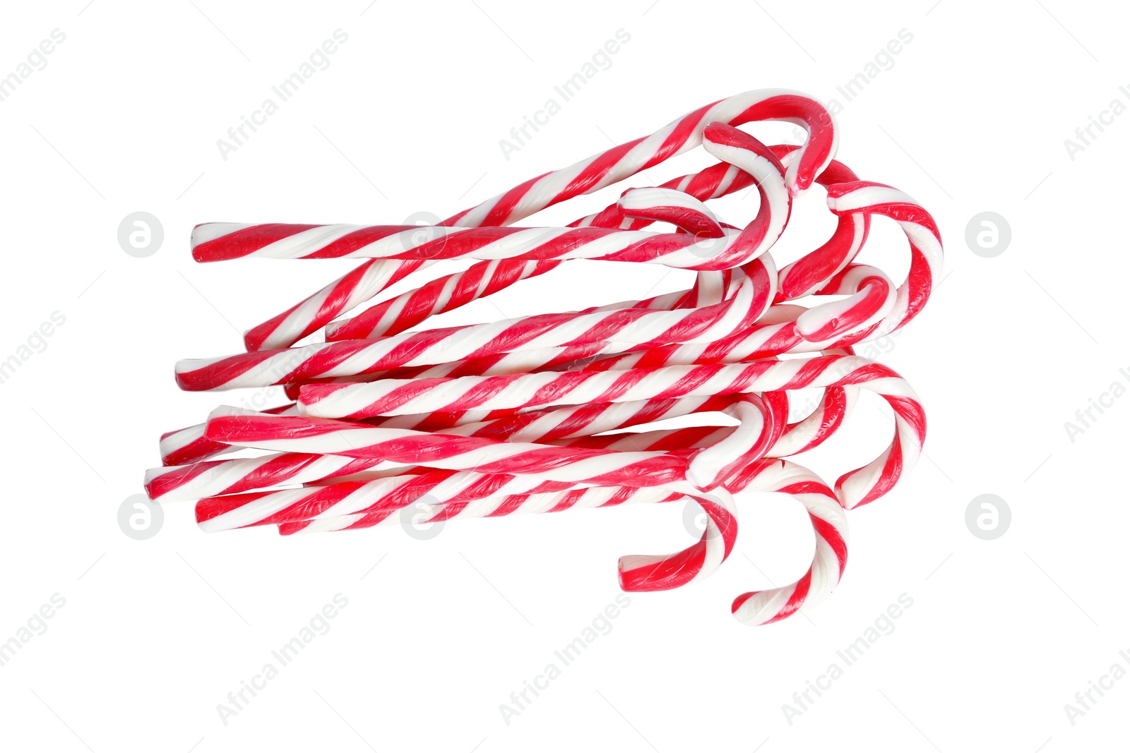 Image of Sweet candy canes on white background, top view. Christmas treat 