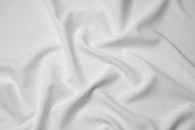 Photo of Texture of blank white flag as background, top view. Mockup for design