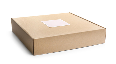 Photo of One closed cardboard box isolated on white