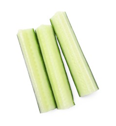 Photo of Pieces of fresh cucumber isolated on white, top view