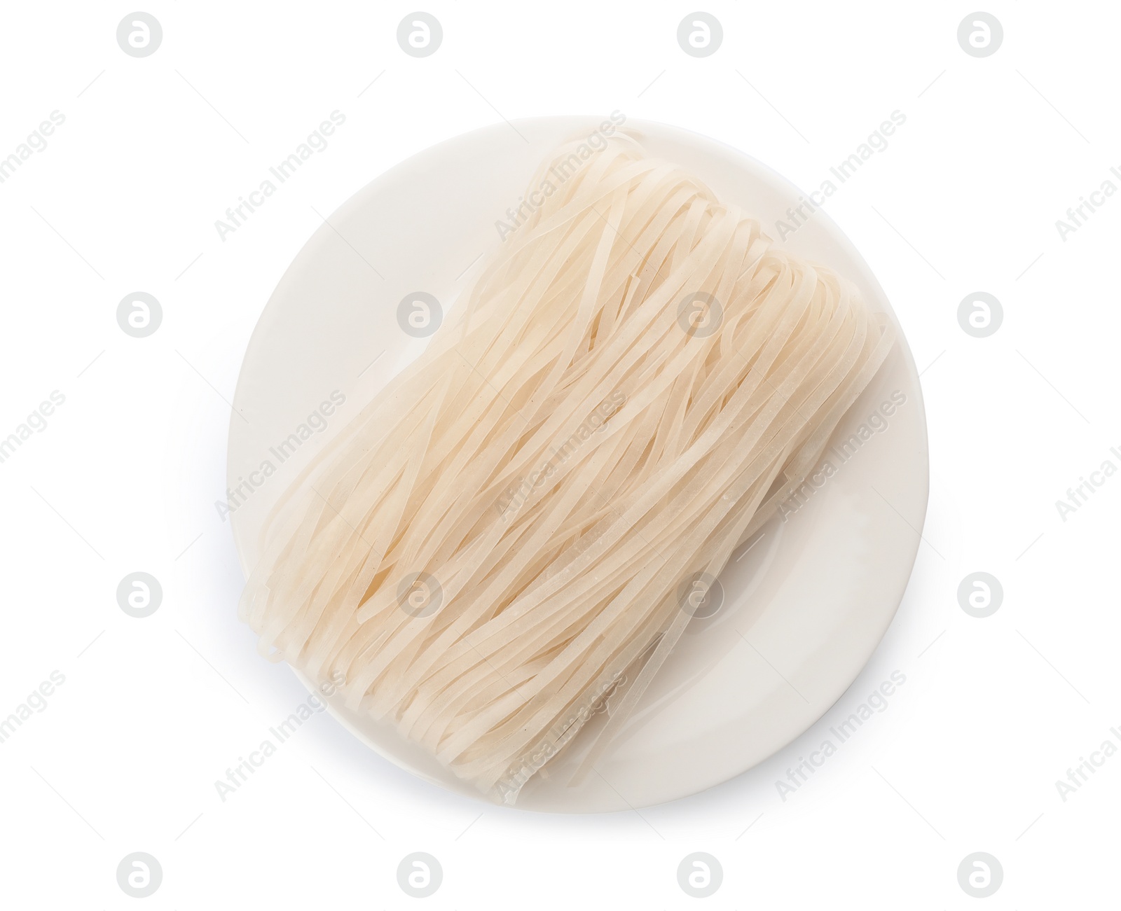 Photo of Plate with raw rice noodles on white background, top view