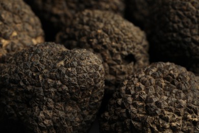 Photo of Closeup view of fresh whole black truffles