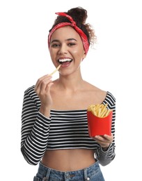 Photo of African American woman eating French fries on white background