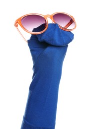 Photo of Funny sock puppet with sunglasses isolated on white