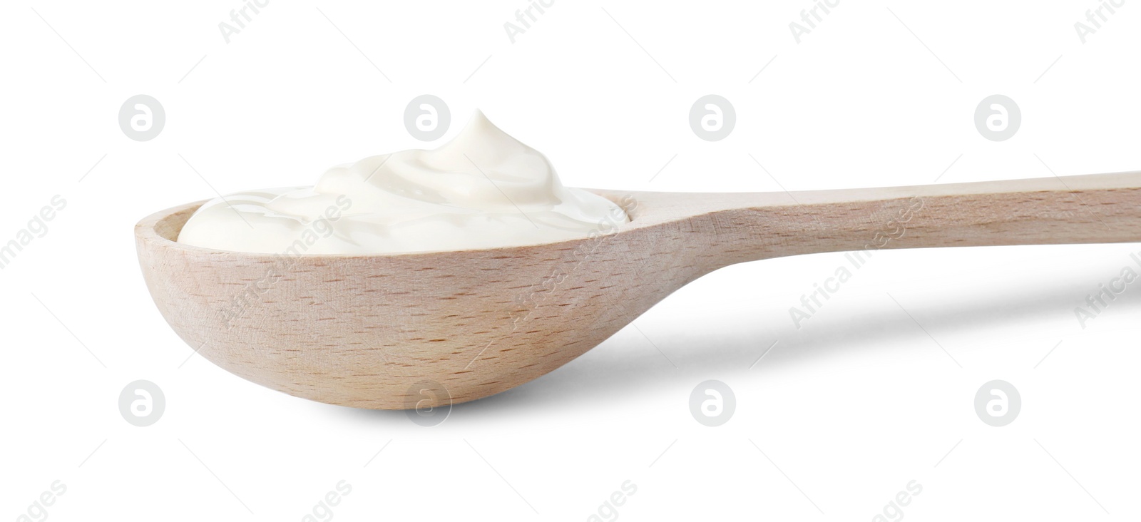 Photo of One wooden spoon with mayonnaise isolated on white