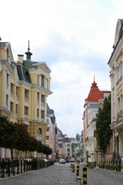 Picturesque view of city street with beautiful buildings