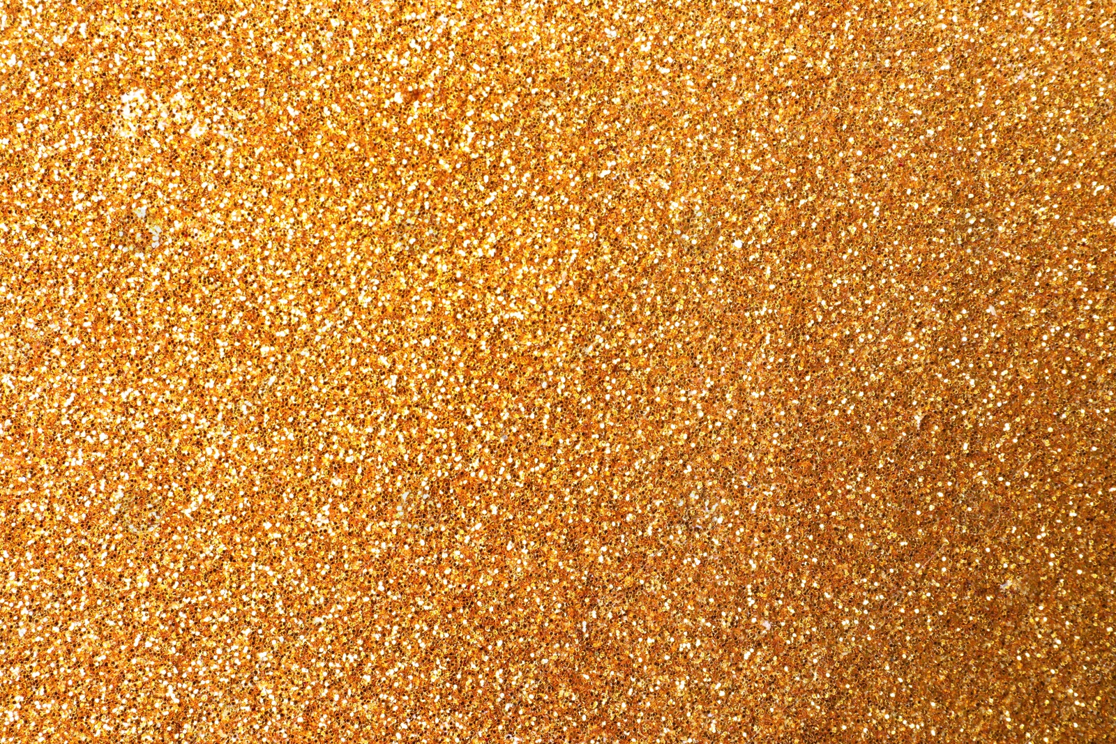 Photo of Beautiful shiny golden glitter as background, closeup