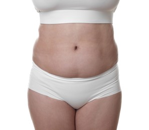 Photo of Woman with excessive belly fat on white background, closeup. Overweight problem